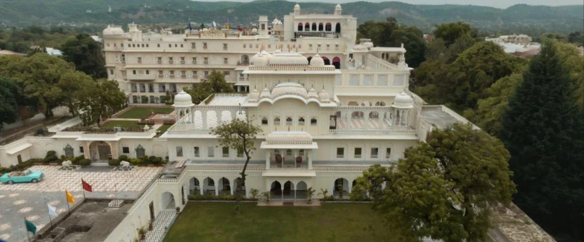 The Raj Palace — drop a wide facade photograph